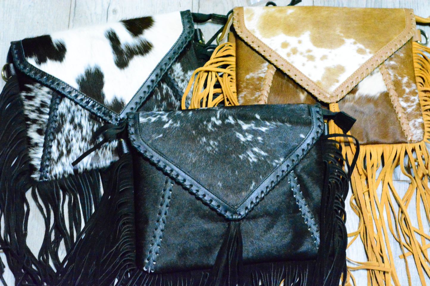 The Untamed Fringe- cowhide crossbody