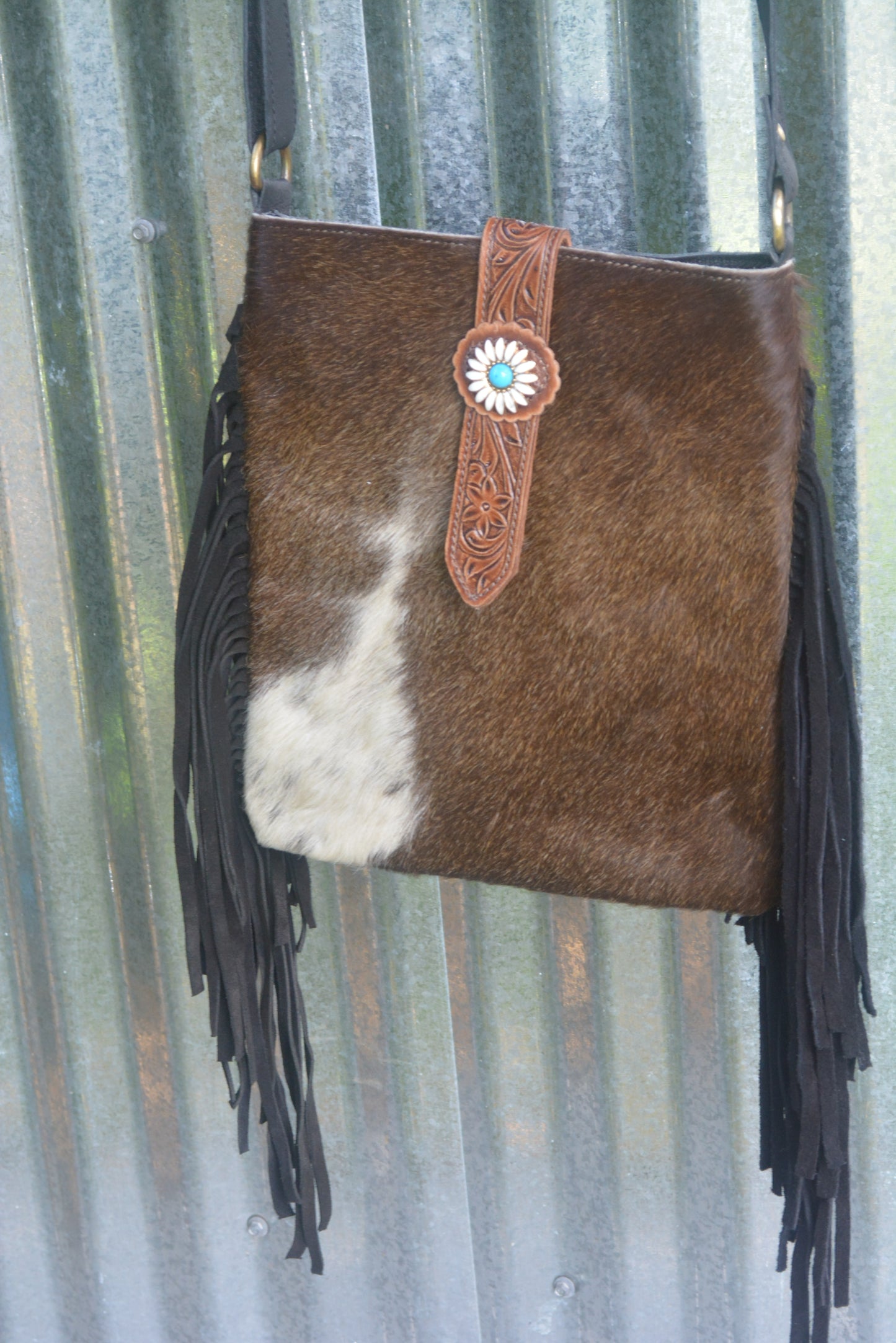 Daisy accent cowhide bag